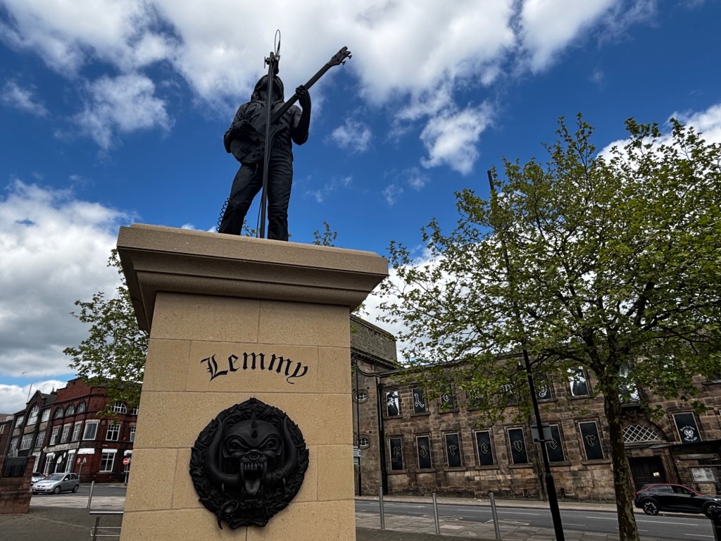 Photos of Lemmy statue outside Barewall art gallery and picture of the HEAD CAT figure